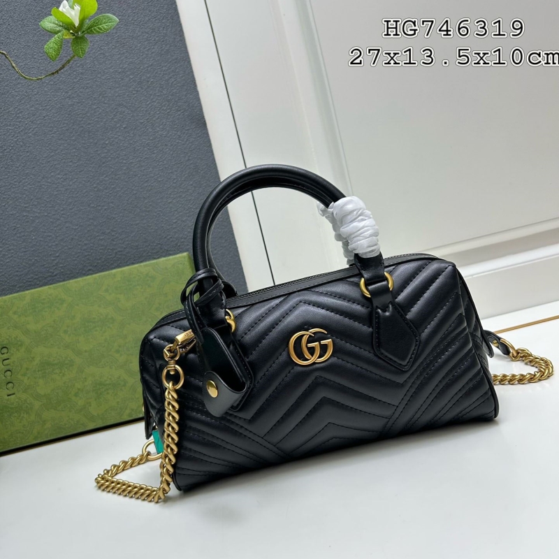 G*u*i top handle bags